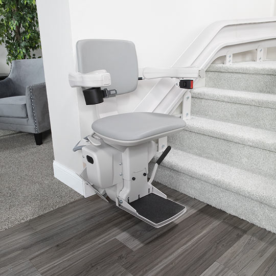 Electric curved stair lift chair